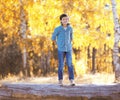 Autumn day, happy boy walking Royalty Free Stock Photo