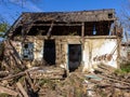 An autumn day, a mountain chalet, a sunny morning, the life of wooden structures, residential buildings falling into disrepair.