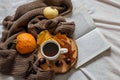 Autumn decorated desk with coffee and book