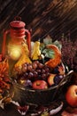 Autumn decoration with basket of fruits and gourds Royalty Free Stock Photo