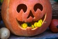 Autumn decoration with pumpkins and flowers on a street in a European city Royalty Free Stock Photo