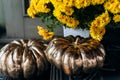 Autumn decoration with pumpkins and flowers on a street in a European city Royalty Free Stock Photo