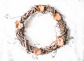 Autumn decorative vine wreath on a light background, top view. Royalty Free Stock Photo