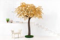 Golden plastic ficus tree