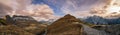 Autumn Dolomites mountain dramatic sunset scene from hiking path betwen Pordoi Pass and Fedaia Lake, Italy. Snowy Marmolada massif Royalty Free Stock Photo