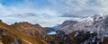 Autumn Dolomites mountain scene from hiking path betwen Pordoi Pass and Fedaia Lake, Italy. Snowy Marmolada Glacier and Fedaia