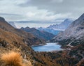 Autumn Dolomites mountain view from hiking path betwen Pordoi Pass and Fedaia Lake, Italy Royalty Free Stock Photo