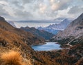 Autumn Dolomites mountain view from hiking path betwen Pordoi Pass and Fedaia Lake, Italy