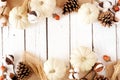 Autumn double border of white pumpkins with brown fall decor on a white wood background Royalty Free Stock Photo