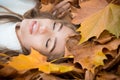 Autumn dreams. Portrait of beautiful young woman outdoors.