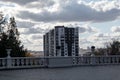 Autumn evening city park and residential building