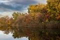 Autumn evening landscape image of the pond at Stansbury Park in Dundalk, Maryland with reflection. Royalty Free Stock Photo