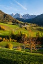 Autumn evening Santa Magdalena famous Italy Dolomites village view in front of the Geisler or Odle Dolomites mountain rocks.