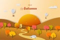 Autumn or fall landscape background on paper art style with colorful trees and hot air balloons Royalty Free Stock Photo