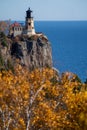 Autumn fall leaves with Split Rock Lighthouse in the distance on Lake Superior Minnesota Royalty Free Stock Photo