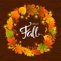 Autumn fall leaves wreath with light bulbs around