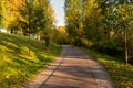 Autumn, Fall scene. Beautiful Autumnal park with pathway. Beauty nature scene. Royalty Free Stock Photo