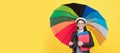 Autumn fall school. teen child under colorful parasol. kid in beret with rainbow umbrella. autumn season. Portrait of Royalty Free Stock Photo