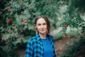 Autumn fall summer woman portrait. Closeup portrait of beautiful Caucasian middle age woman in park looking in camera. Pensive Royalty Free Stock Photo