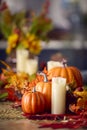 Autumn Or Fall Table Decoration At Home With Pumpkins Candle And Leaves Royalty Free Stock Photo