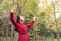 Autumn / fall woman happy in free freedom pose Royalty Free Stock Photo