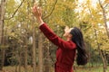 Autumn fall woman happy in free freedom pose Royalty Free Stock Photo