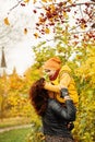 Autumn Family. Loving Mother and Son in Fall Park Royalty Free Stock Photo