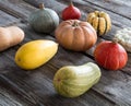 Autumn farming with organic pumpkins over old wood background