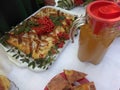 Homemade cakes with apples and a decanter with Apple juice.