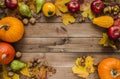 Autumn flat lay composition frame, with copy space on wooden background. Royalty Free Stock Photo