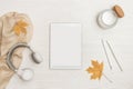 Autumn flat lay home work with laptop or tablet, notebook and headphones, aromatic candle Royalty Free Stock Photo