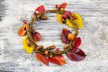 Autumn floral wreath on rustic wooden background Royalty Free Stock Photo