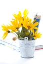 Autumn flowers with book and pencils Royalty Free Stock Photo