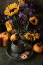 Autumn flowers with cup of tea Royalty Free Stock Photo