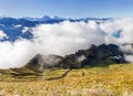 Autumn fog rising from the Brienzsee Lake over the cliff group Dirrengrind Royalty Free Stock Photo