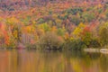 Autumn foliage and reflection in Vermont, Elmore state park Royalty Free Stock Photo