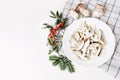 Autumn food arrangement. Composition of whole and sliced porcino mushrooms, ceps on plate. Rowan berries, leaves, fir