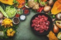Autumn food. Beef, pumpkin, vegetables, mushrooms, root vegetables, spices, pearl barley - ingredients for fall soup preparation. Royalty Free Stock Photo