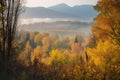 autumn forest with foggy morning light, view of the mountain range in the background Royalty Free Stock Photo