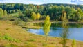 Autumn forest lake nature landscape in Estonia on a sunny day. Royalty Free Stock Photo