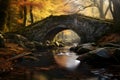 Autumn forest with old stone bridge across the stream. Royalty Free Stock Photo