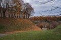 Autumn forest path. Orange color tree, red brown maple leaves in fall city park Royalty Free Stock Photo