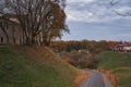 Autumn forest path. Orange color tree, red brown maple leaves in fall city park Royalty Free Stock Photo