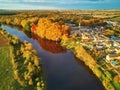 Autumn forest and river Vienne near medieval castle of Les Ormes, France Royalty Free Stock Photo