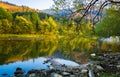 Autumn forest and sky and mountains and river