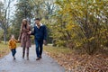 Autumn forest walk with the son family Royalty Free Stock Photo