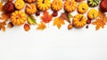 Autumn frame. Colorful maple leaves and pumpkins on white background. Flat lay, top view, copy space. Autumn fall, harvest, Royalty Free Stock Photo