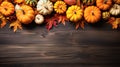 Autumn frame. Colorful maple leaves and pumpkins on wooden background. Flat lay, top view, copy space. Autumn fall, harvest, Royalty Free Stock Photo