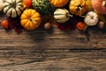 Autumn harvest flat lay. Top view pumpkins, gourds on wooden table. Thankgiving Day banner design Royalty Free Stock Photo