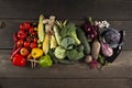 Autumn harvest of homemade vegetables on a wooden background. An assortment of multicolored organic raw food